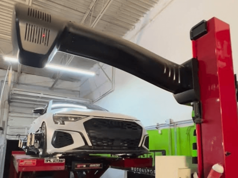 Car on the alignment lift at SelfMade MotorSports